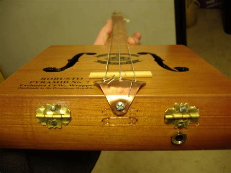 how to make an electric cigar box guitar|cigar box guitar for beginners.